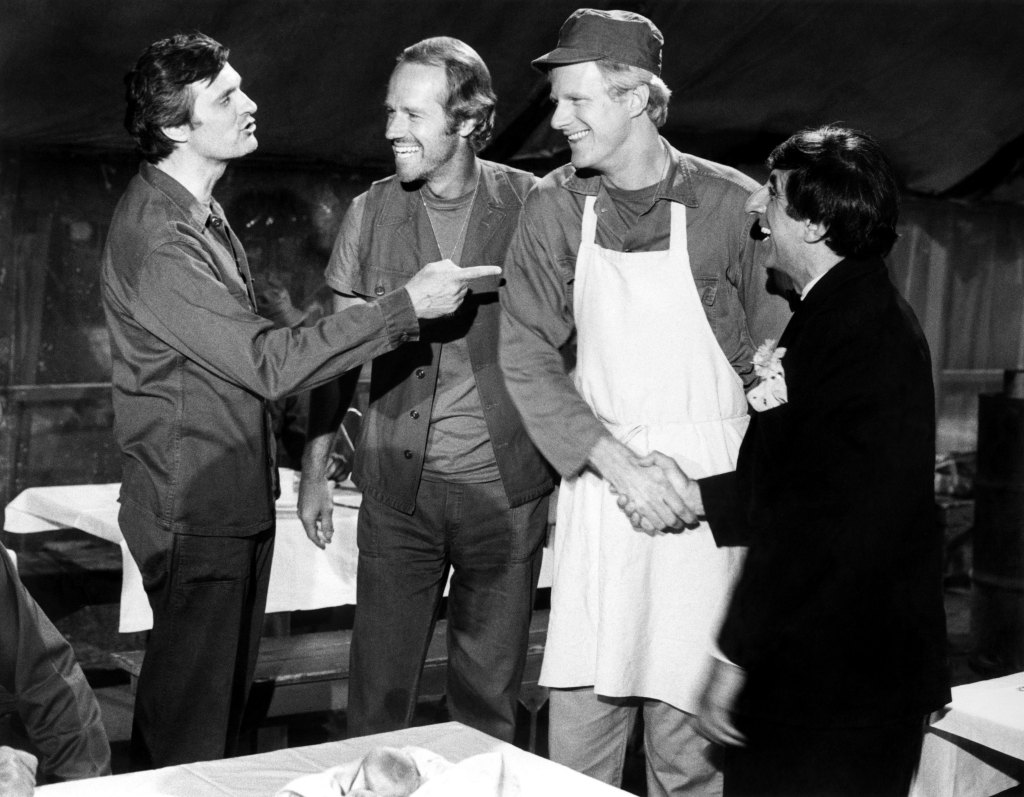 MASH, (aka M*A*S*H), from left: Alan Alda, Mike Farrell, Ed Begley Jr., Jamie Farr in 'Too Many Cooks' (Season 8, Episode 1, aired September 17, 1979)