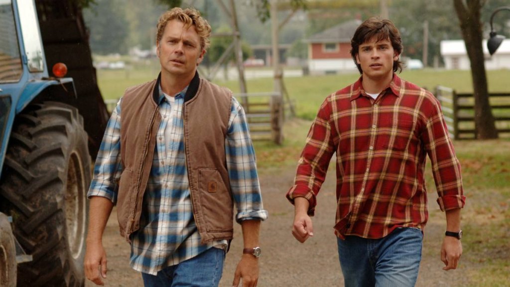 two men walking; john schneider young