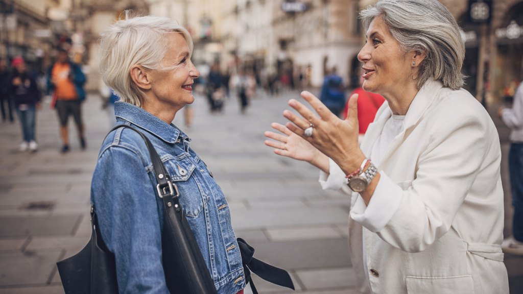 two older women engaging in small talk
