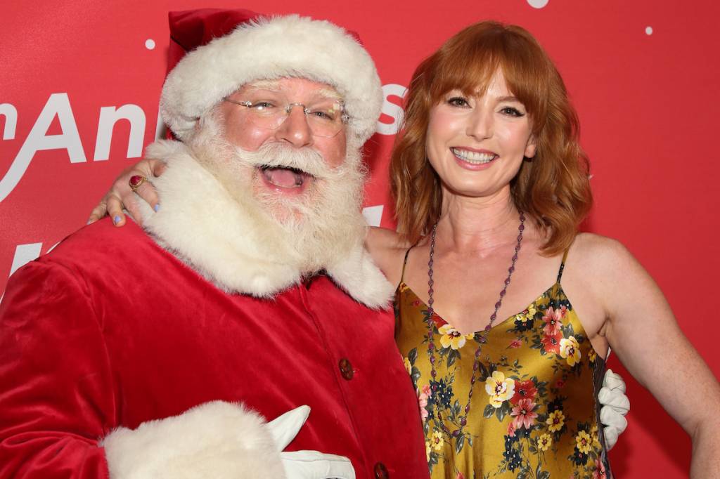 Alicia Witt with Santa at a Hallmark event in 2019