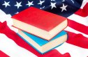 Books on american flag. American education concept.