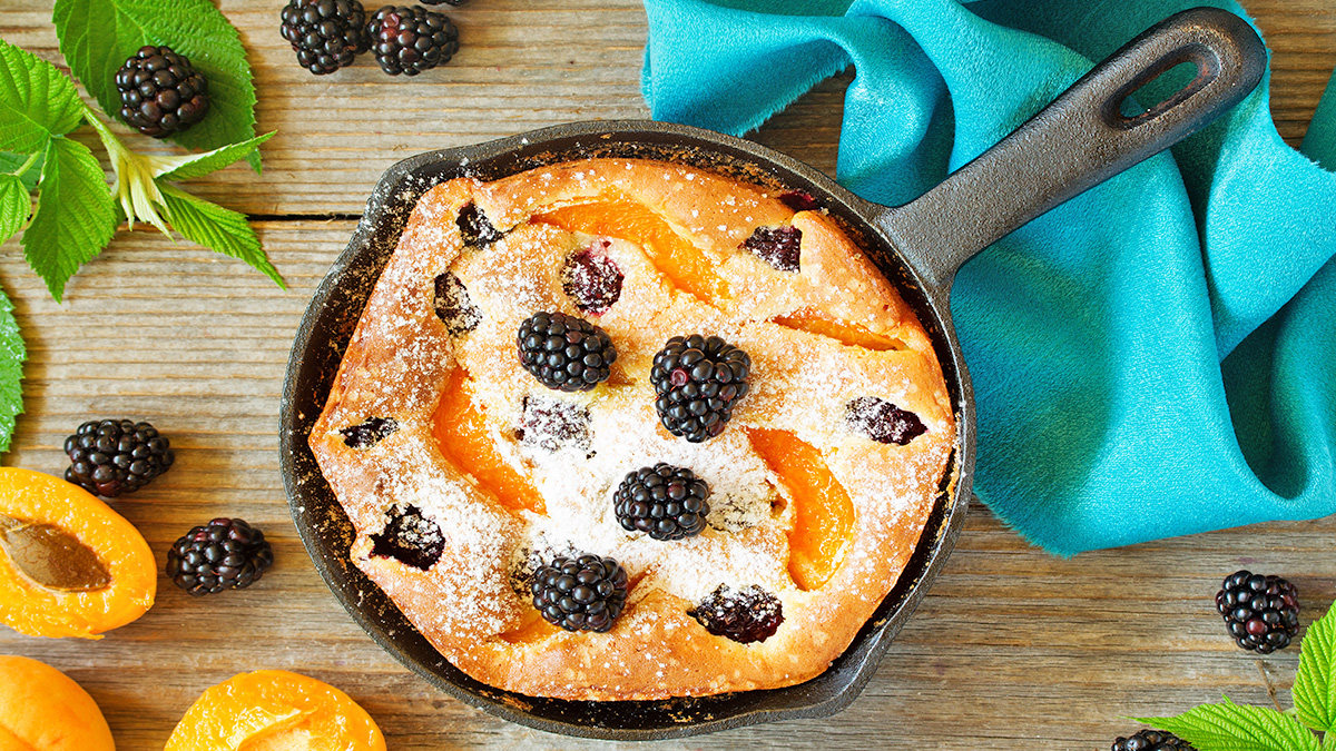 Blackberry and apricot cobbler in a cast iron skillet