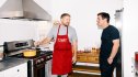 Chef Tim Hollingsworth and BJ Novak standing in a kitchen for the Roku special Chain Food All-Star Dishes