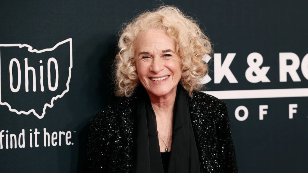 woman smiling; carole king songs