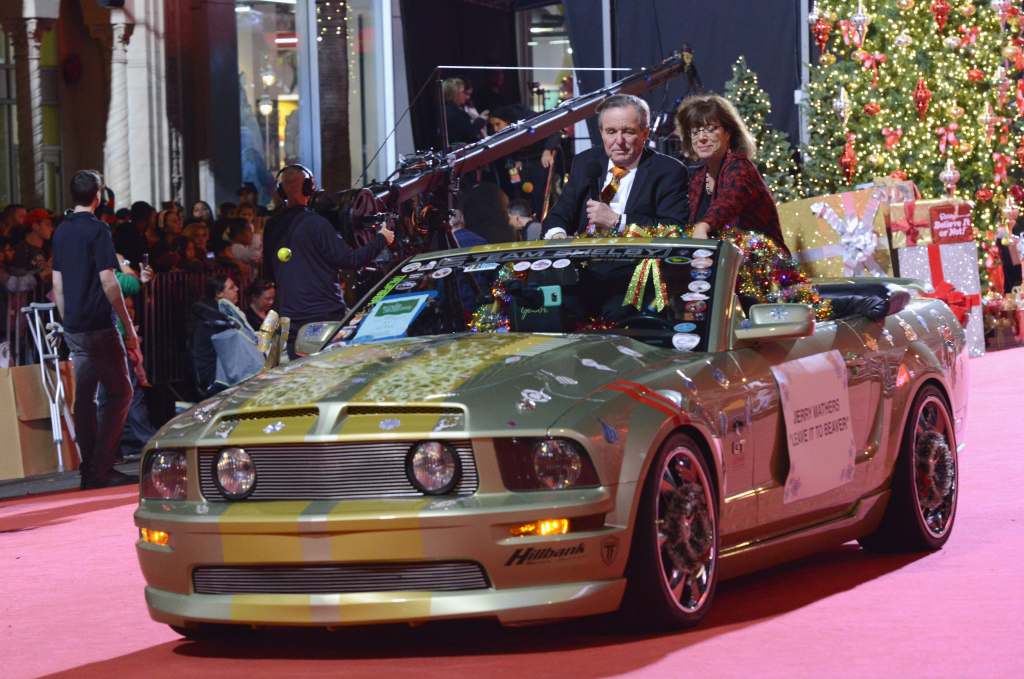  Actor Jerry Mathers and wife participate in the 87th Annual Hollywood Christmas Parade on November 25, 2018 in Hollywood, California. 