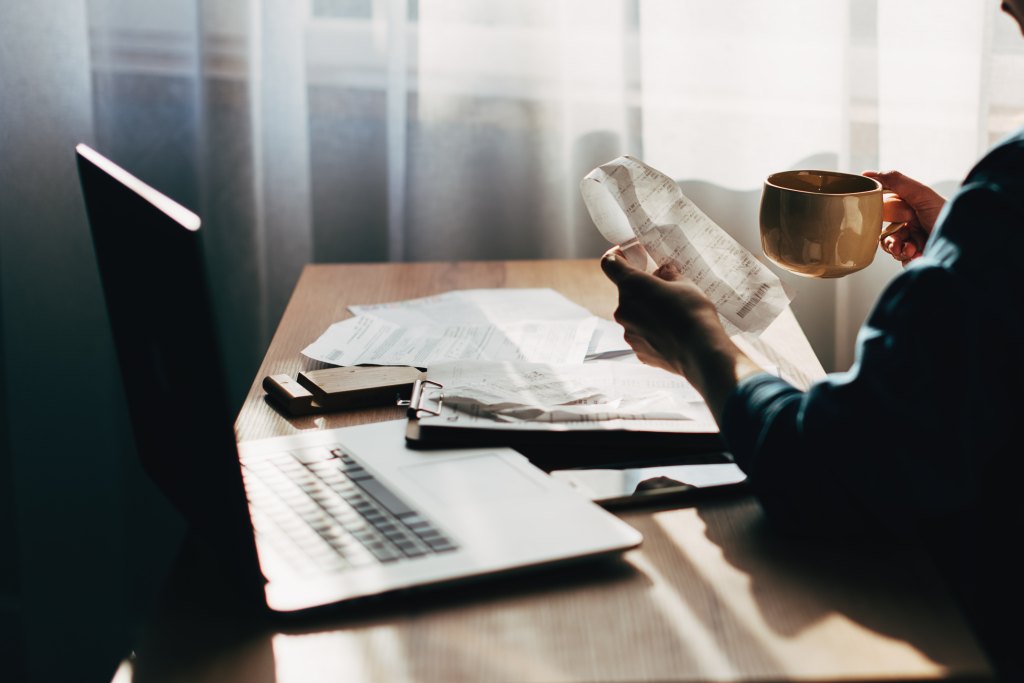 person looking at paperwork