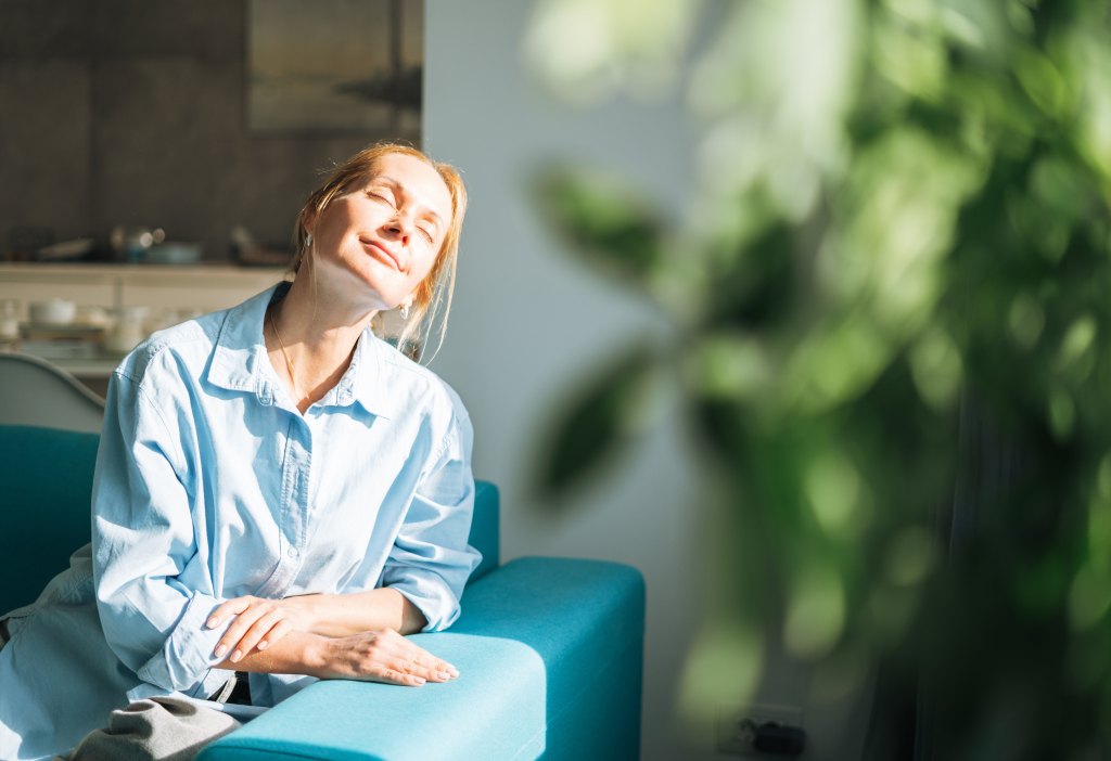 woman smiling looking peaceful
