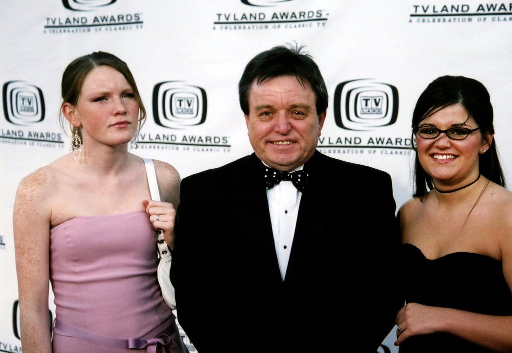 Actor Jerry Mathers (Gerald Patrick Mathers) poses for photos with his daughters Gretchen and Mercedes on the red carpet during the 2nd Annual TV Land Awards at the Hollywood Palladium in Los Angeles, California on March 17, 2004. 
