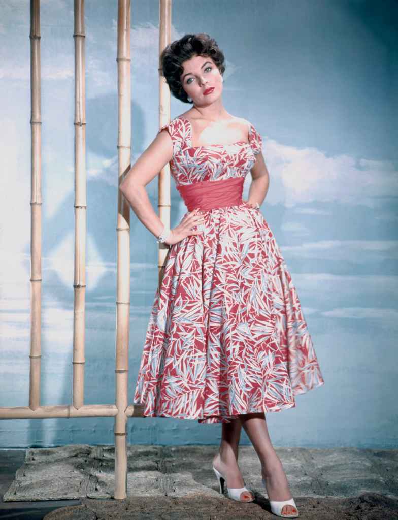 Joan Collins in a bamboo-print day dress in the '50s