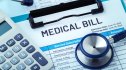 Medical bill concept on blue background, hospital payment and health care cost