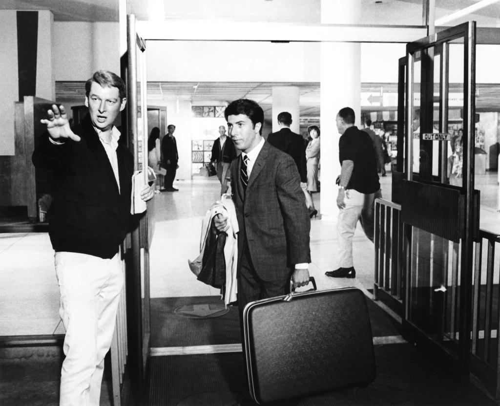 THE GRADUATE, from left, director Mike Nichols, Dustin Hoffman, on-set, 1967