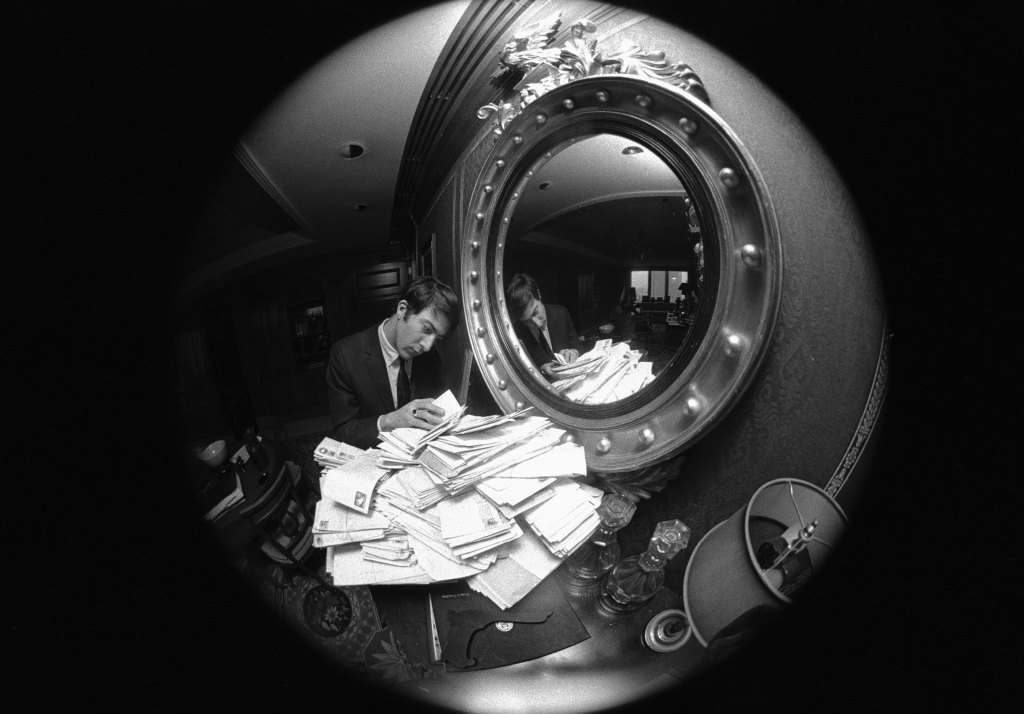 Dustin Hoffman looking at his fan mail for The Graduate