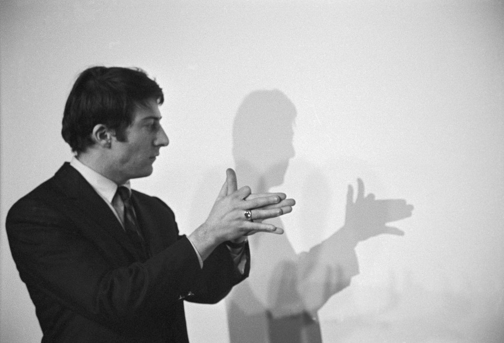 Dustin Hoffman making shadow puppets