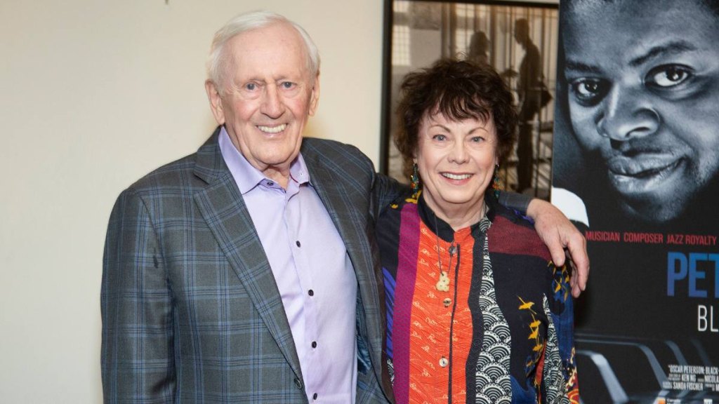 man and woman smiling