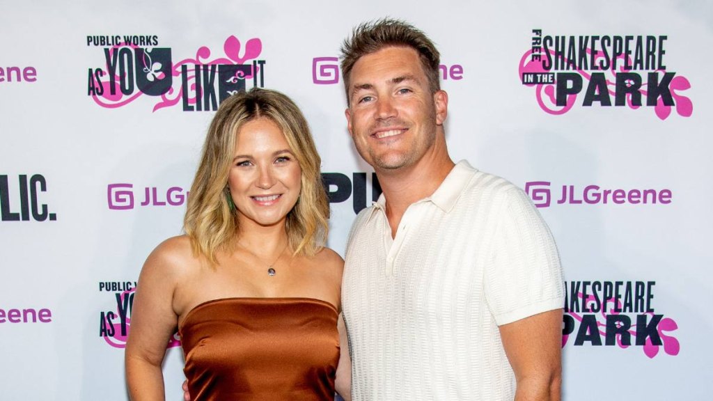 man and woman smiling