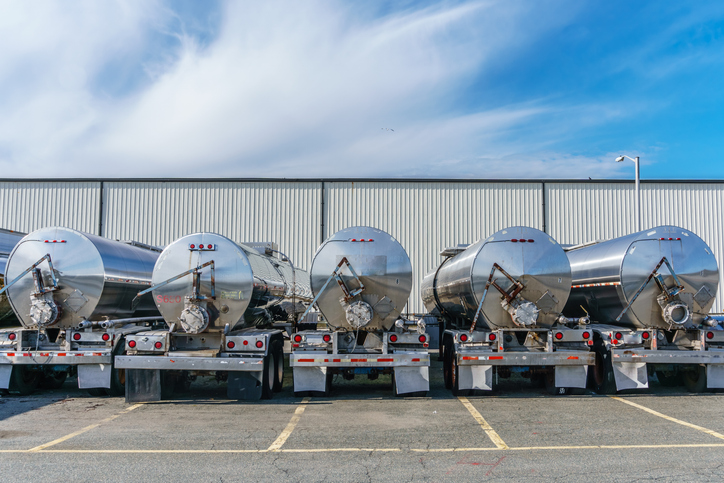 Row of tanker trucks outside