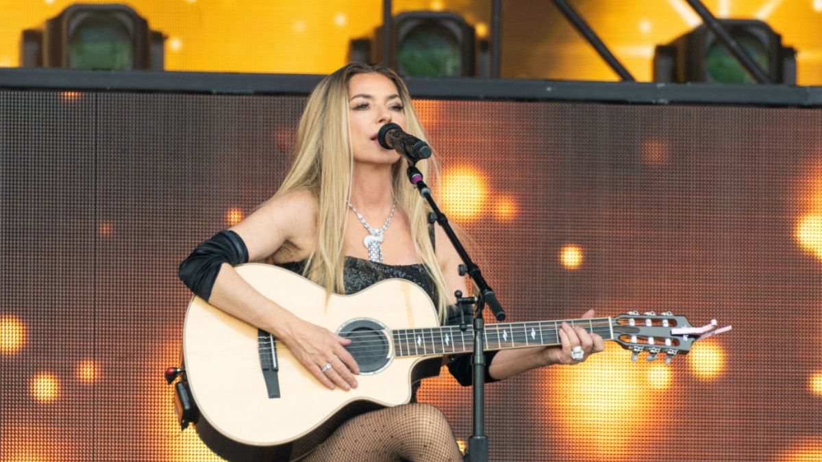 Shania Twain performing at Glastonbury Festival after developing Lyme disease