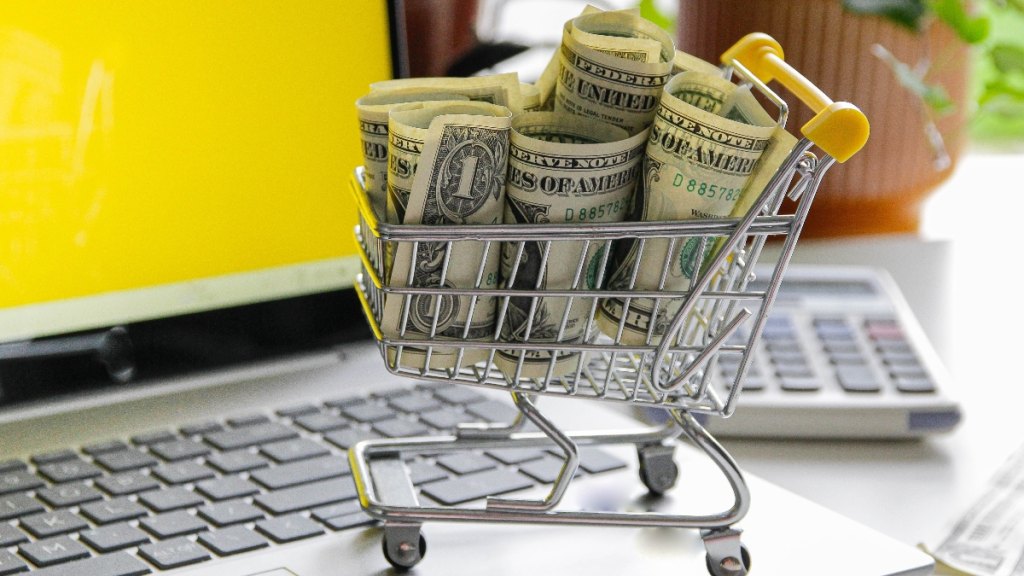 A shopping cart full of money
