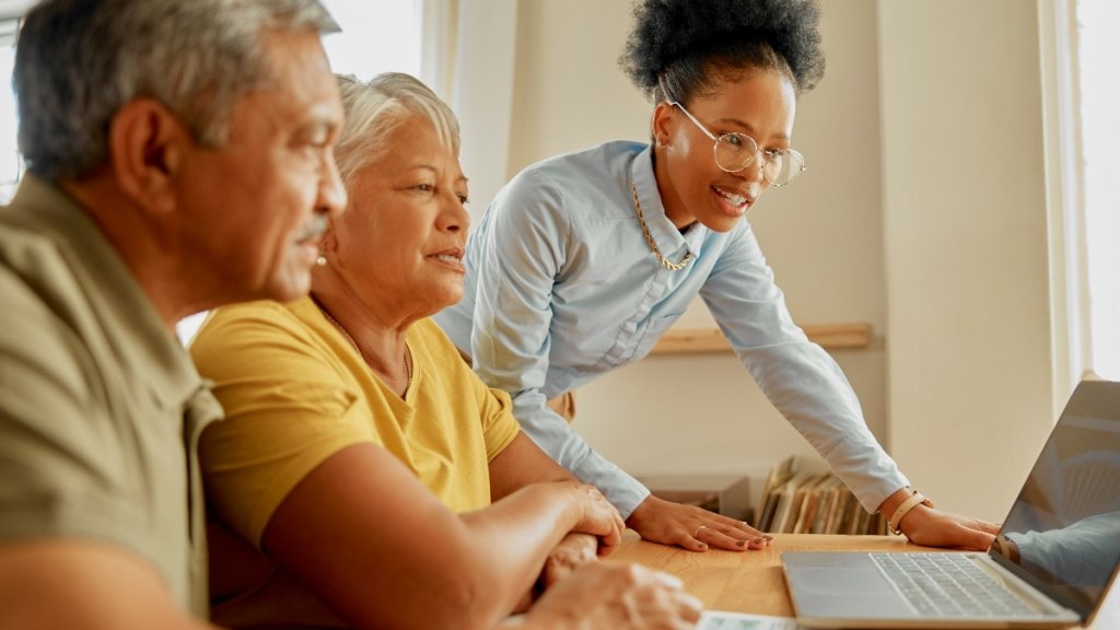 A senior couple applying for energy assistance