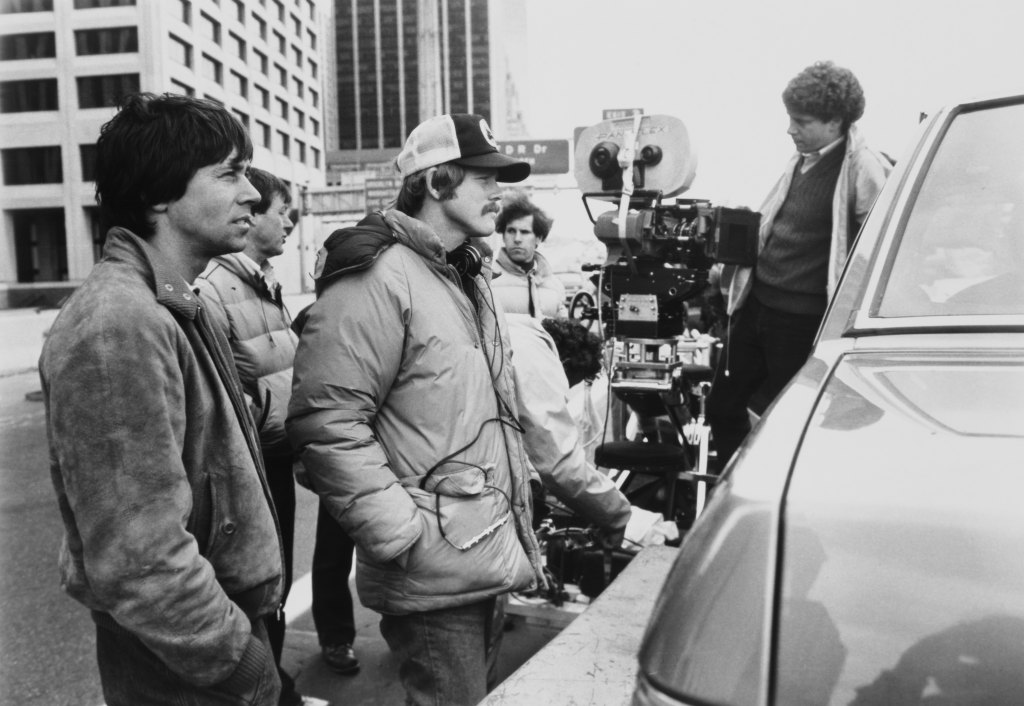 American actor and director Ron Howard (center) with producer Brian Grazer (left) on the set of the film 'Splash' in New York City, USA, 1984