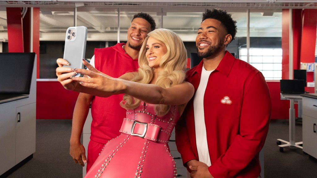 Meghan Trainor on set with Patrick Mahomes and Jake from State Farm