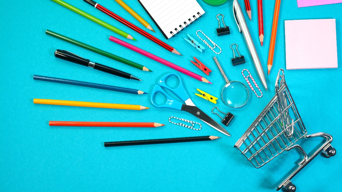 school supplies coming out of shopping cart