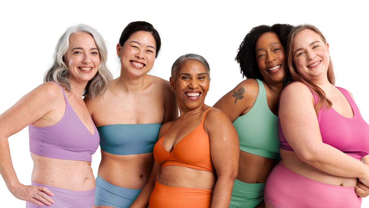 Group of 5 women standing next to each other