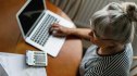 Senior woman using laptop