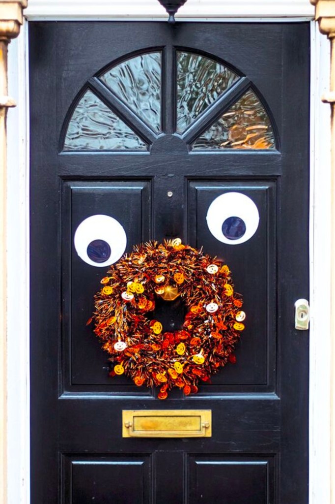 A door with googly eyes