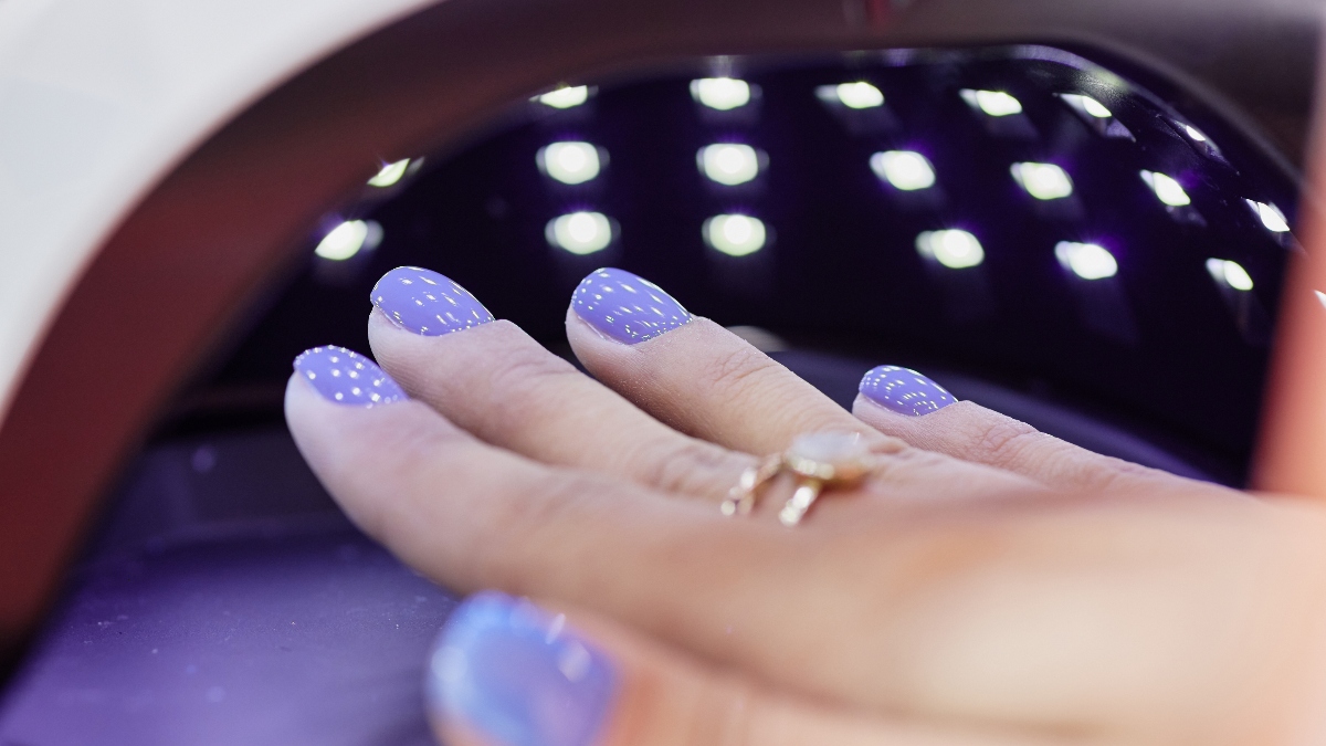 person getting a gel manicure