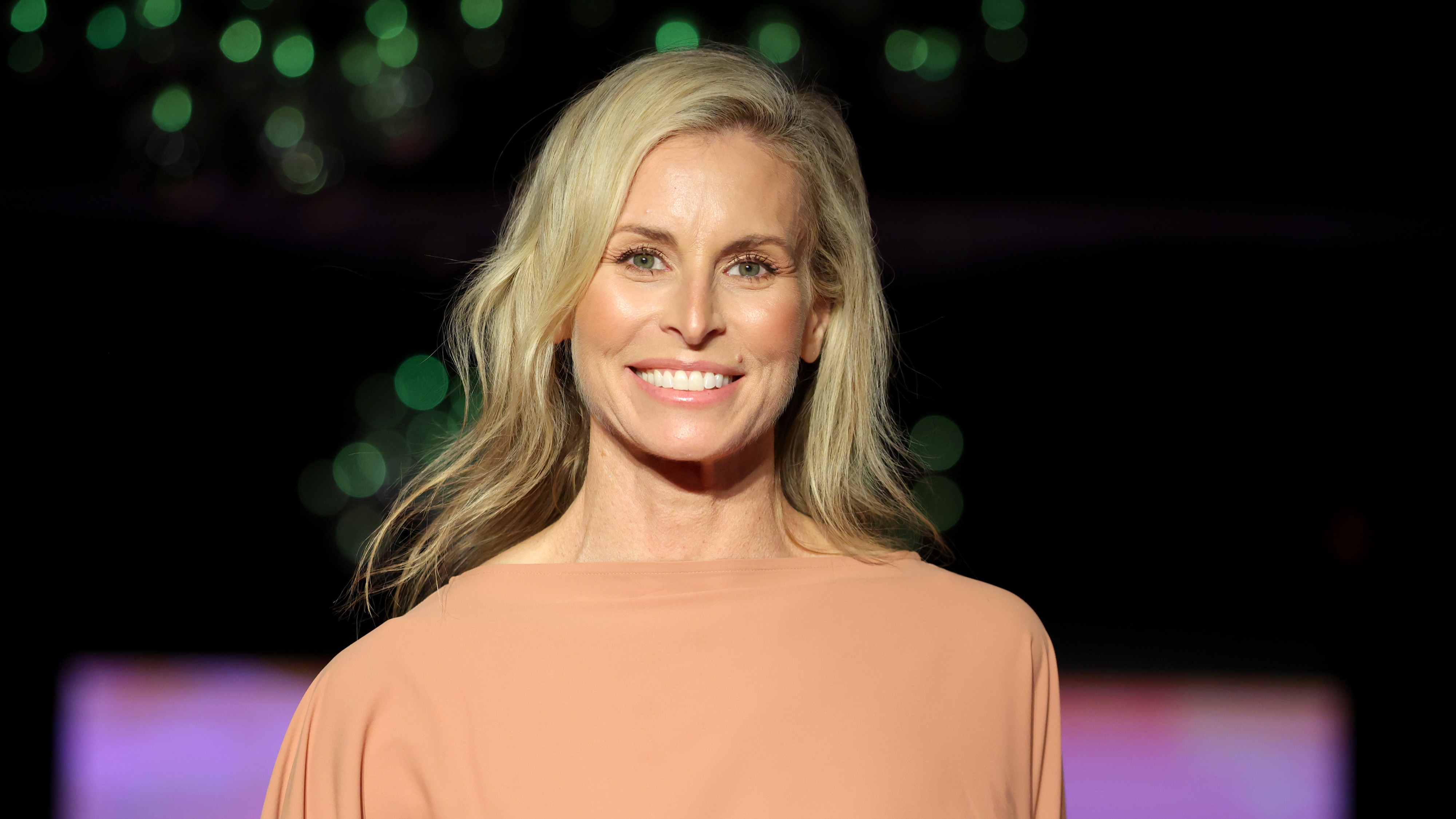 Niki Taylor walks the runway at the Coolibar Mott50 Edition Sun Safe Soirée Fashion Presentation