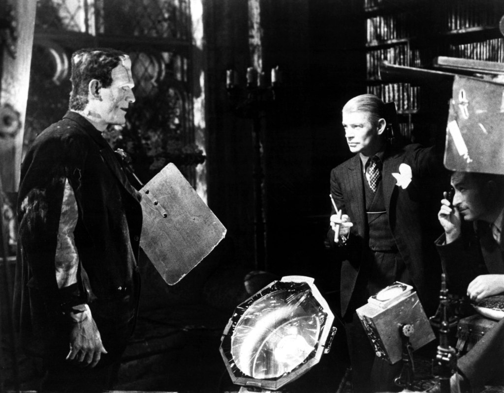 BRIDE OF FRANKENSTEIN, Boris Karloff being directed by James Whale on set, 1935
