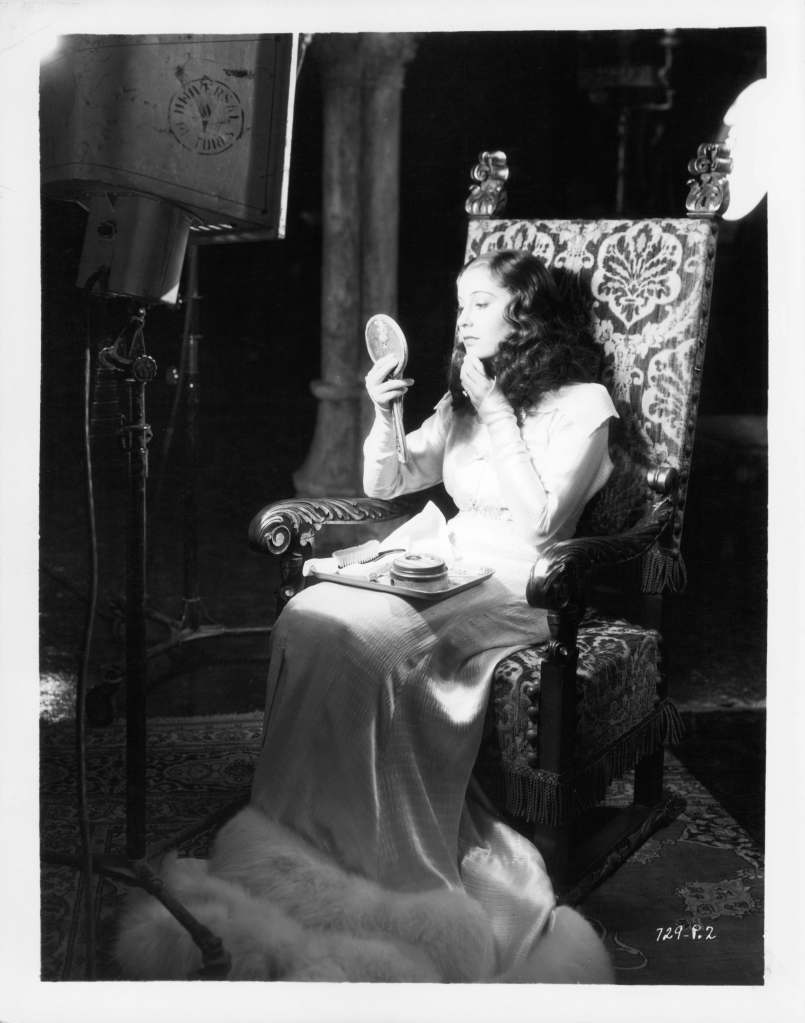 Valerie Hobson does her makeup in between takes of the film 'The Bride Of Frankenstein', 1935