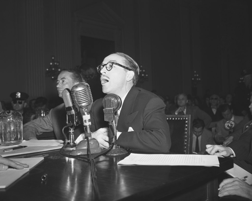 (Original Caption) 10/28/1947-Washington, DC: Dalton Trumbo, above, Hollywood screenwriter, refused today to tell the House Un American Activities Committee whether he was a Communist and was ordered to leave the witness stand. 