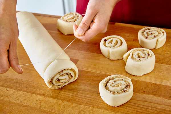 Slicing Cinnamon Rolls with Floss
