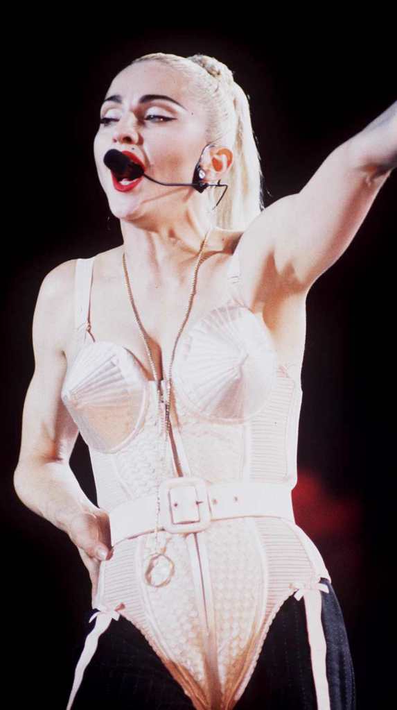 Madonna wearing her iconic cone bra