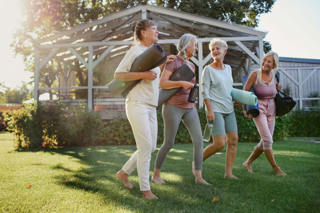group of mature women heading out to exercise