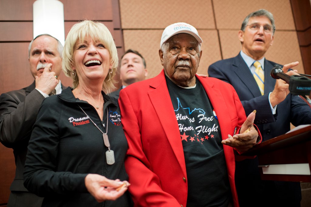 From left, Rep. David McKinley, R-W-Va., Dreama Denver, of Always Free Honor Flight, Rep. Alex Mooney, R-W.Va., Sgt. John M. Watson, 96, of Beckley, W.Va., and Sen. Joe Manchin, D-Va., attend a luncheon in the Capitol Visitor Center where Watson received a Congressional Gold Medal and was recognized by the Tuskegee Airmen Association, May 20, 2015. 