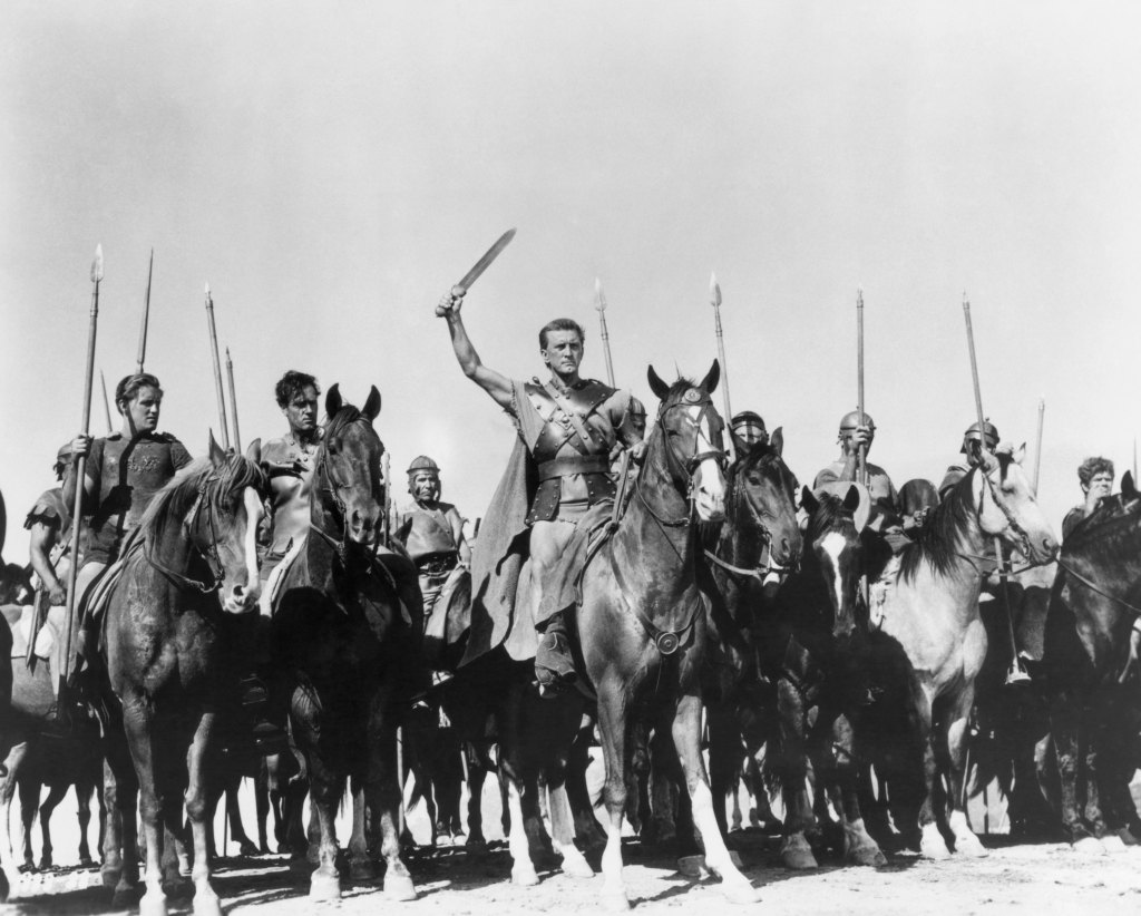 (Original Caption) Kirk Douglas prepares to signal the start of a charge into battle. A scene from Spartacus.