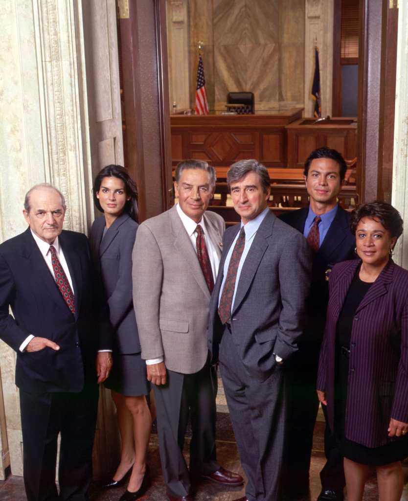 The cast of Law & Order (left to right: Steven Hill, Angie Harmon, Jerry Orbach, Sam Waterston, Benjamin Bratt and S. Epatha Merkerson) in 1998