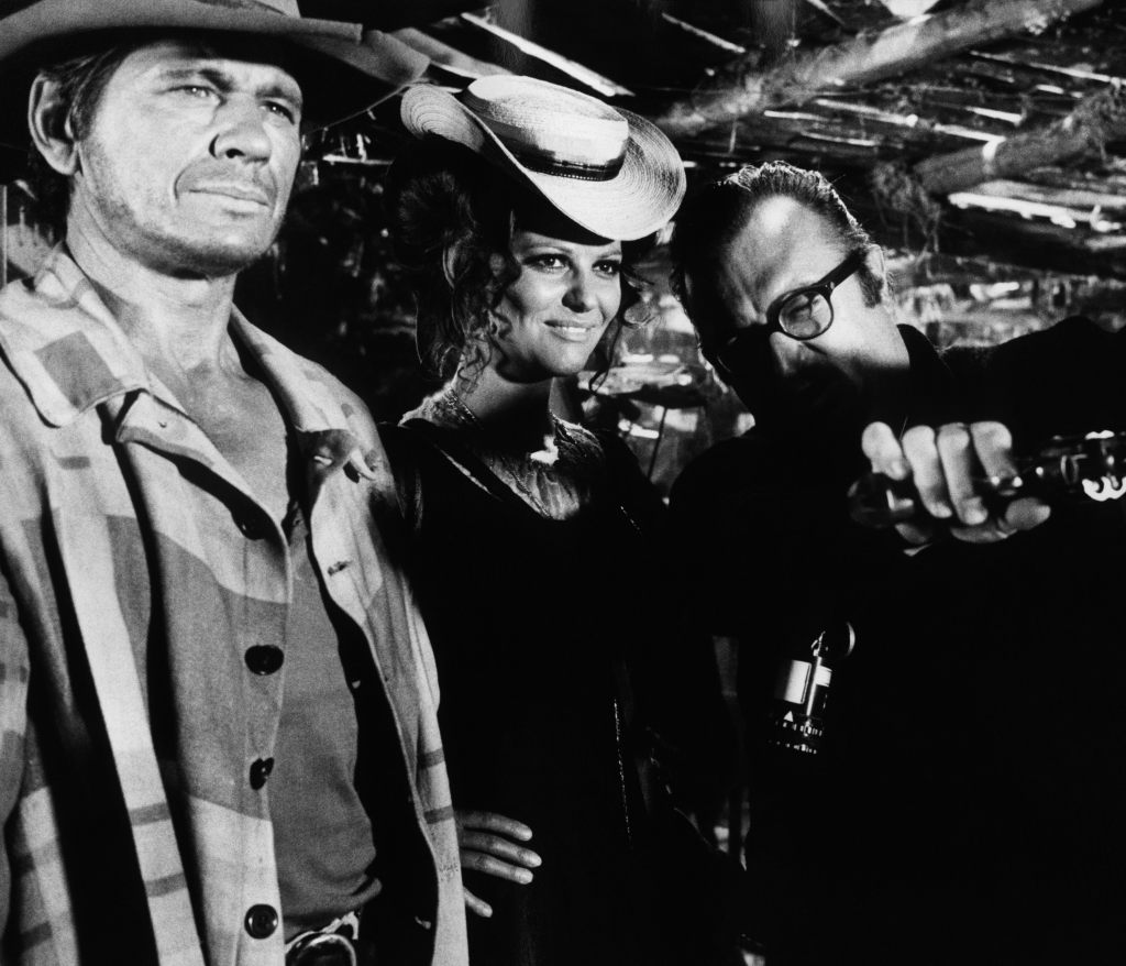 Charles Bronson, Claudia Cardinale and Sergio Leone on the set of Once Upon a Time in the West
