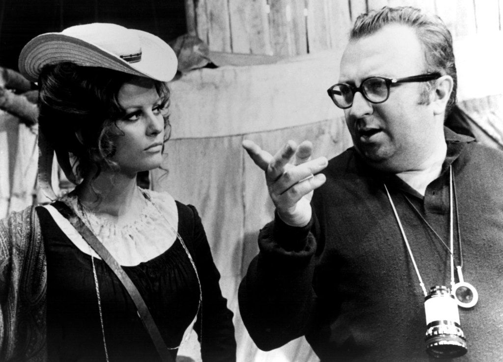 Italian actress Claudia Cardinale with director, screenwriter and producer Sergio Leone on the set of Once Upon a Time in the West
