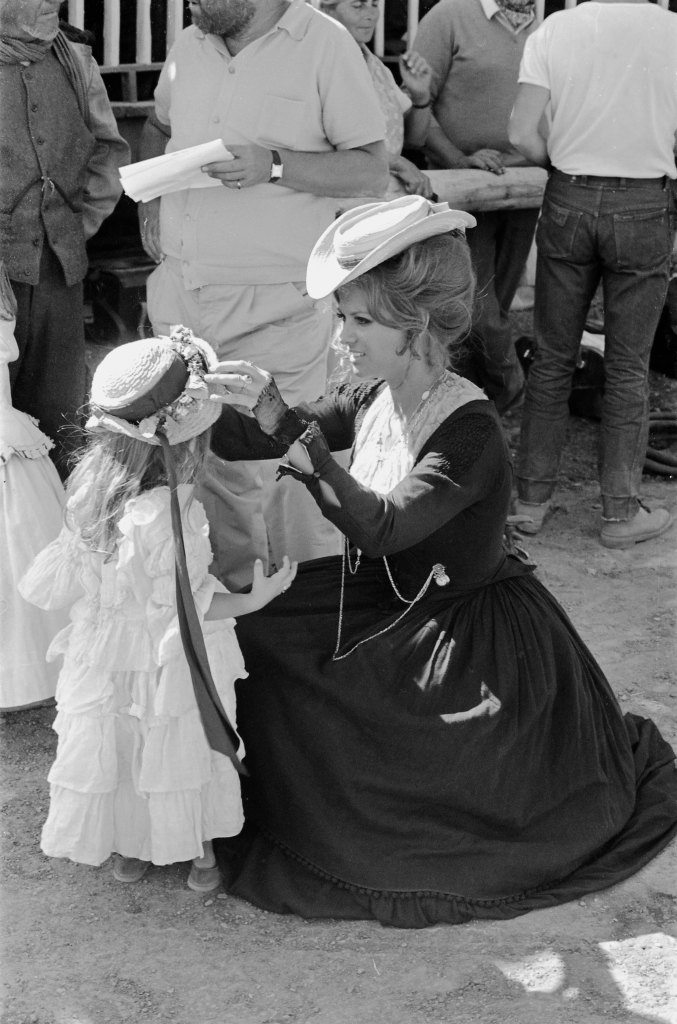 Claudia Cardinale and little girl behind the scenes of Once Upon a Time in the West