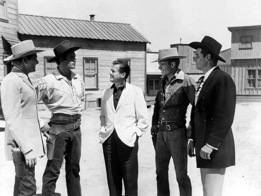 TV producer WILLIAM T. ORR (center) surrounded by his Warners western series stars (L-R): WAYDE PRESTON [Colt .45], CLINT WALKER [Cheyenne], WILL HUTCHINS [Sugarfoot] and JAMES GARNER [Maverick], 1958