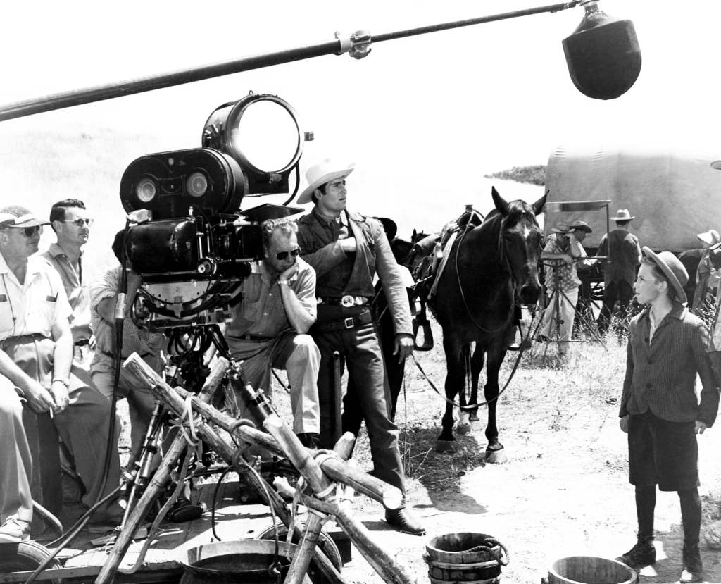 CHEYENNE, from left, director Richard L. Bare (chin in hand), Clint Walker, Billy Chapin, on set for 'Julesburg,' aired October 11, 1956 (1955-63).