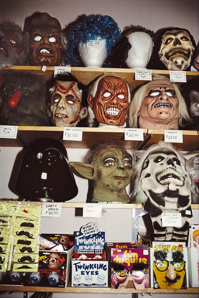 Halloween masks on display at a costume shop in 1982
