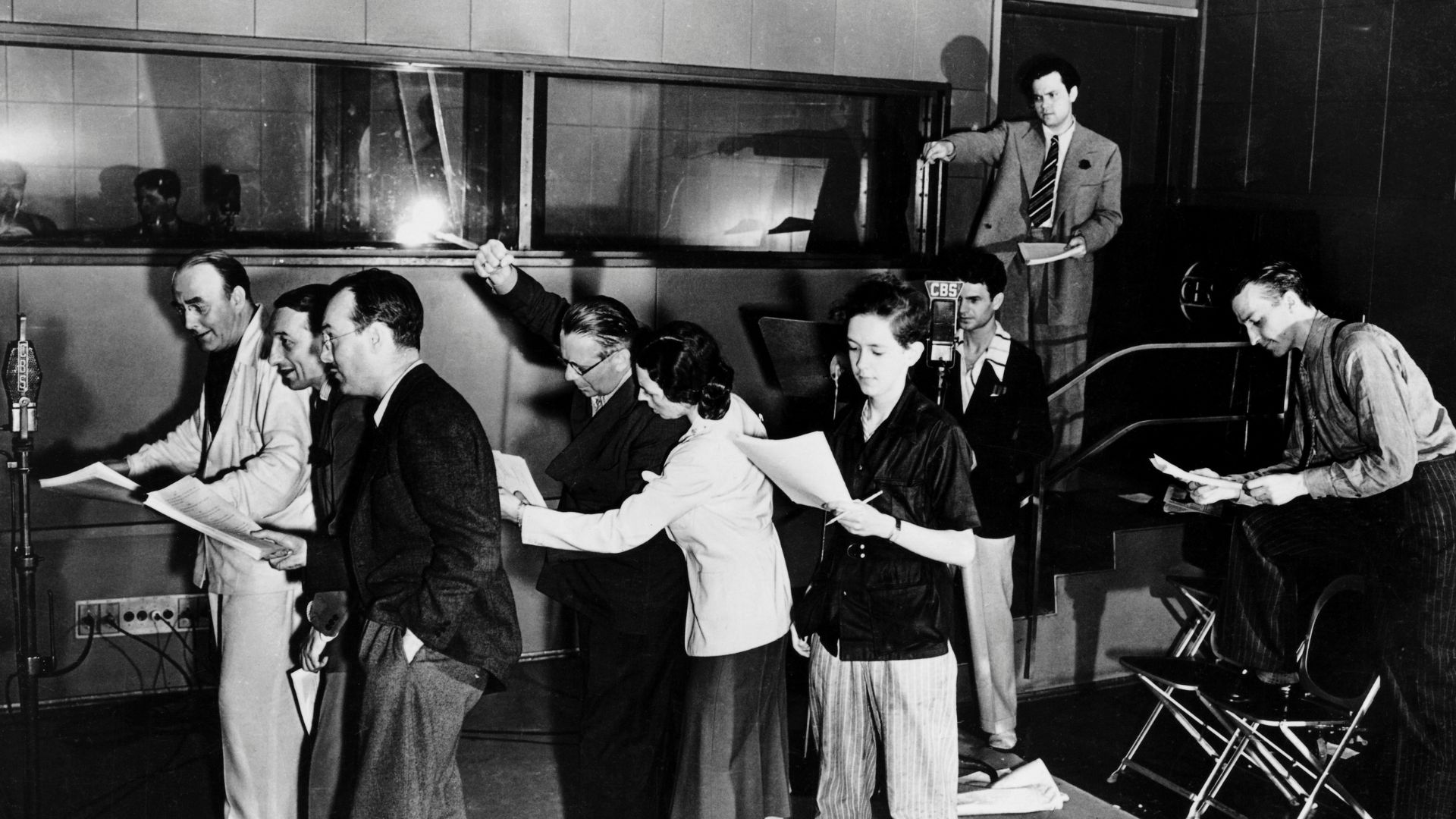 Orson Welles rehearsing for his 'War of the Worlds' broadcast (1938)