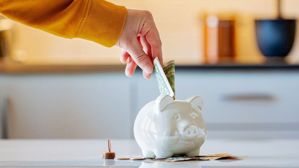 women saving money