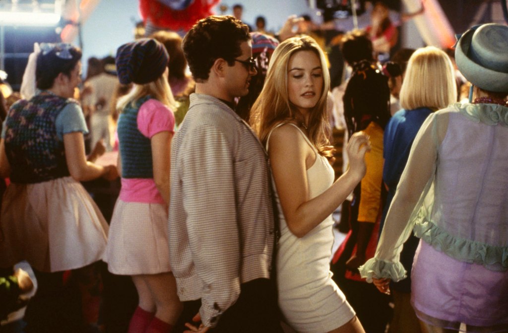 Alicia Silverstone wears her Calvin Klein dress while at a party with Justin Walker