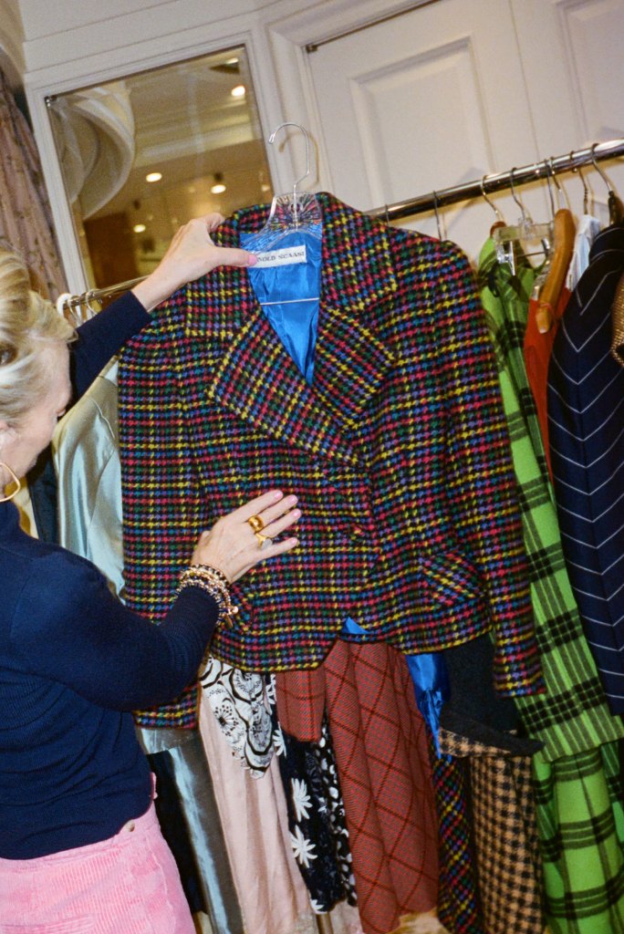 Elyce Arons inspects a blazer from Mary Tyler Moore's closet